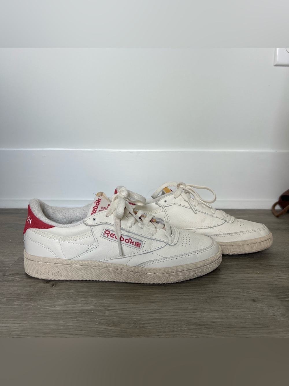 Reebok White Sneakers with Red Heel Accent